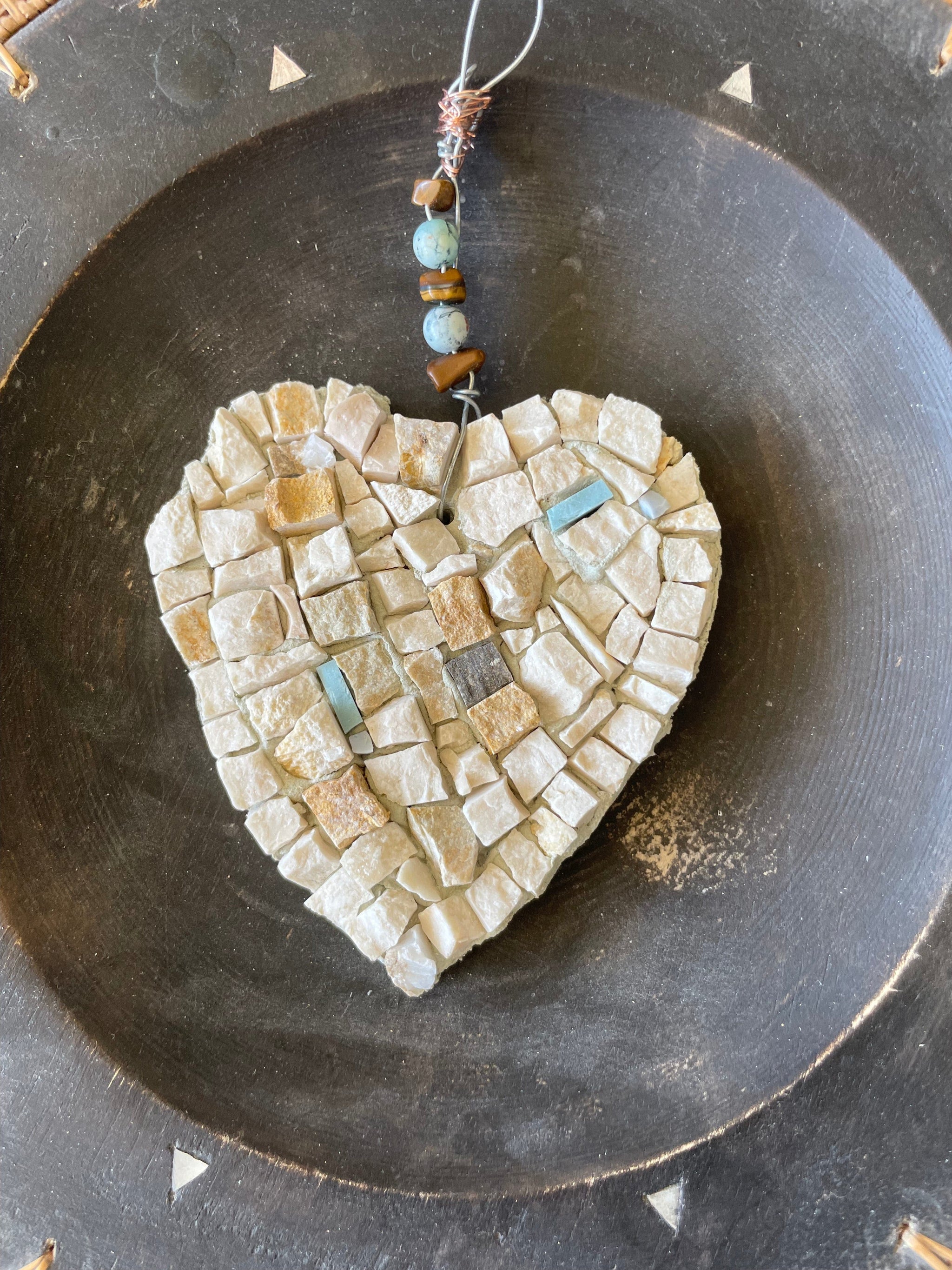 Heart mosaic ; This artwork in marble with pale blue highlights is  country core decor - features a wire hanger with beads and tiger eyes
