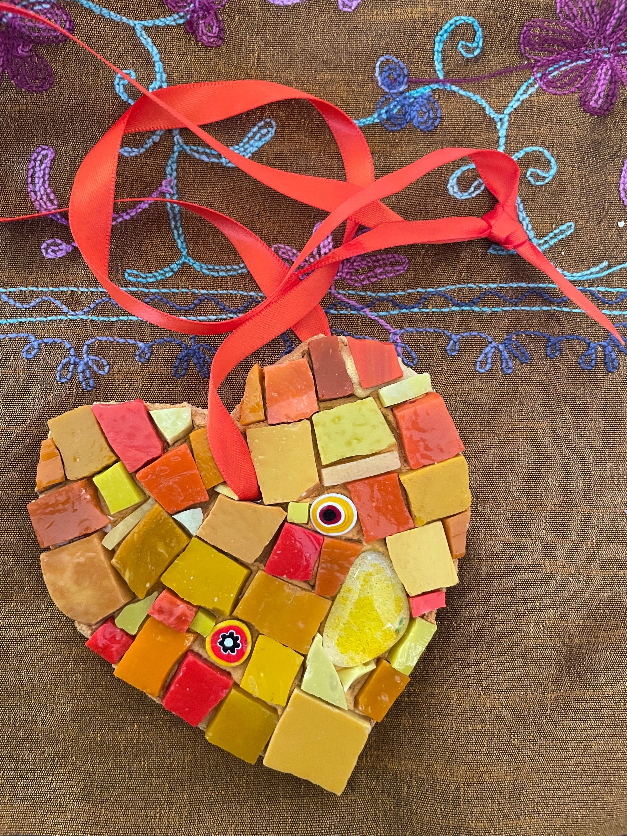 WinterCreek Mosaics Small work Mosaic artwork- This heart is glass artwork in orange colours.