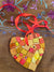 WinterCreek Mosaics Small work Mosaic artwork- This heart is glass artwork in orange colours.